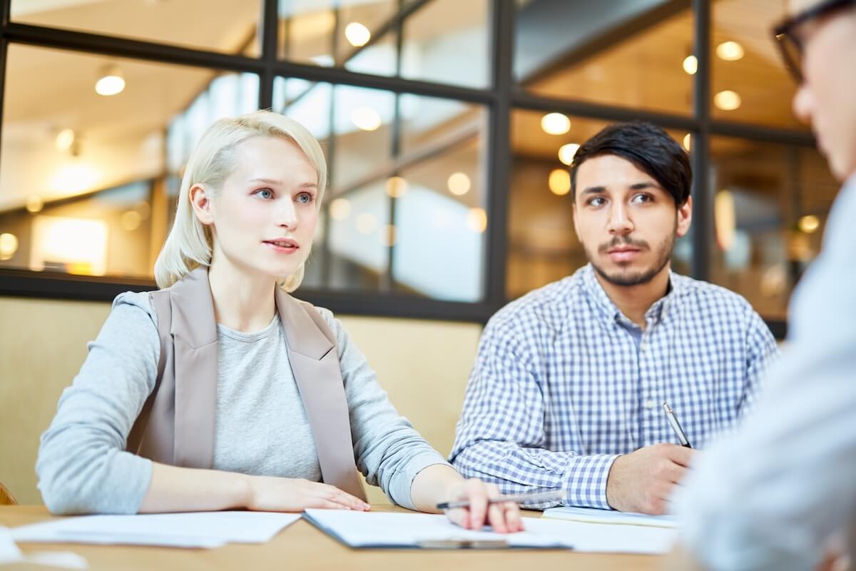 Absenteeism in the workplace: HR staff talking to an employee