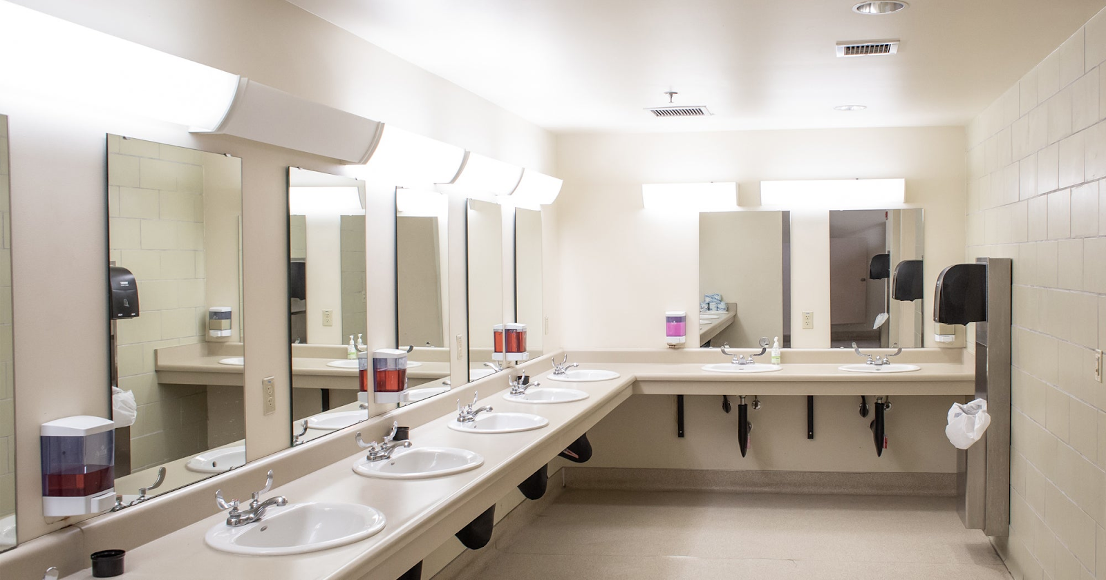 A shared bathroom facility picture is shown inside of a hotel