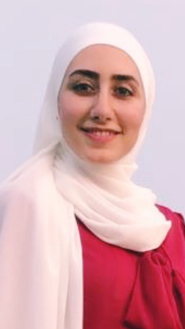 A person wearing a white head scarf

Description automatically generated with low confidence