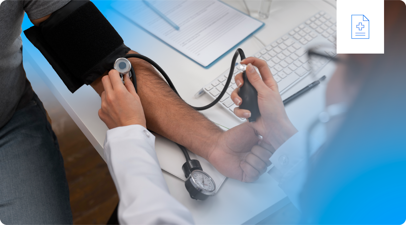 A medical professional takes a patient's blood pressure.