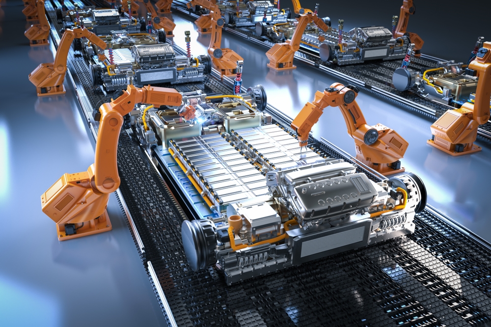 robots and conveyor belts on an automated factory floor