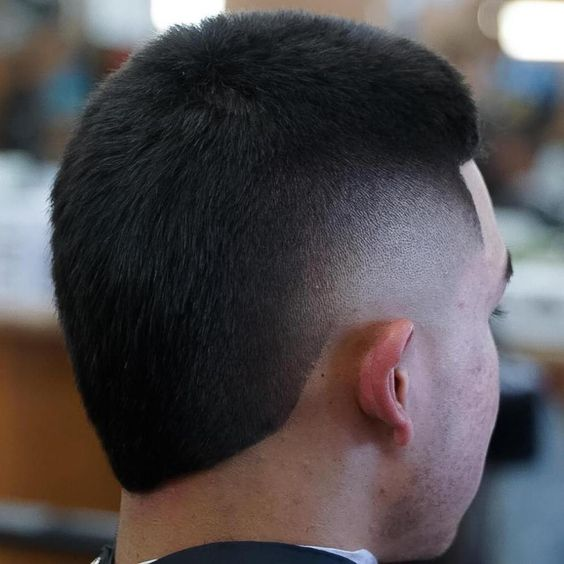 Back view of a man wearing the Temple Skin Fade