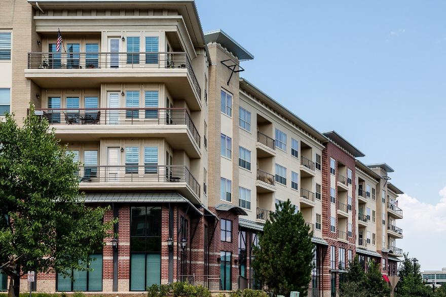 A row of multistory apartment buildings

Description automatically generated
