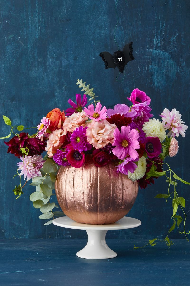 pumpkin carving ideas, pumpkin with flowers inside