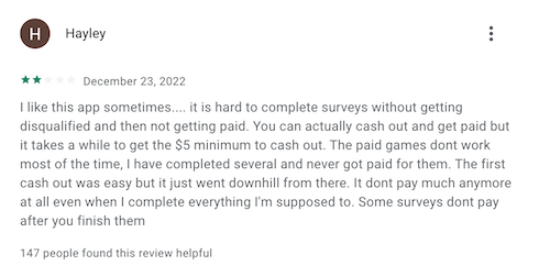 A 2-star Google Play store review from a Survey Spin user who likes things about the app but is frustrated with getting disqualified so often and with glitches they keep encountering. 