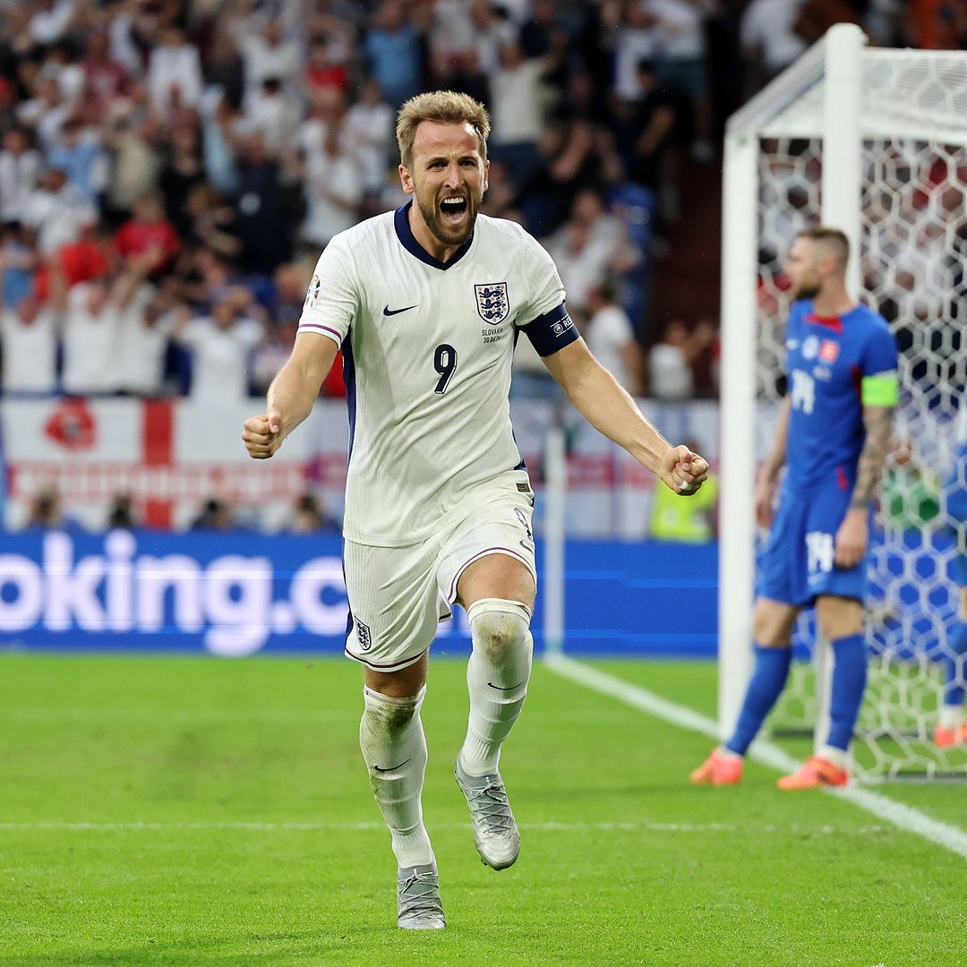 Photo shared by Harry Kane on June 30, 2024 tagging @england. May be an image of 2 people, people playing football, people playing soccer, crowd, stadium and text.