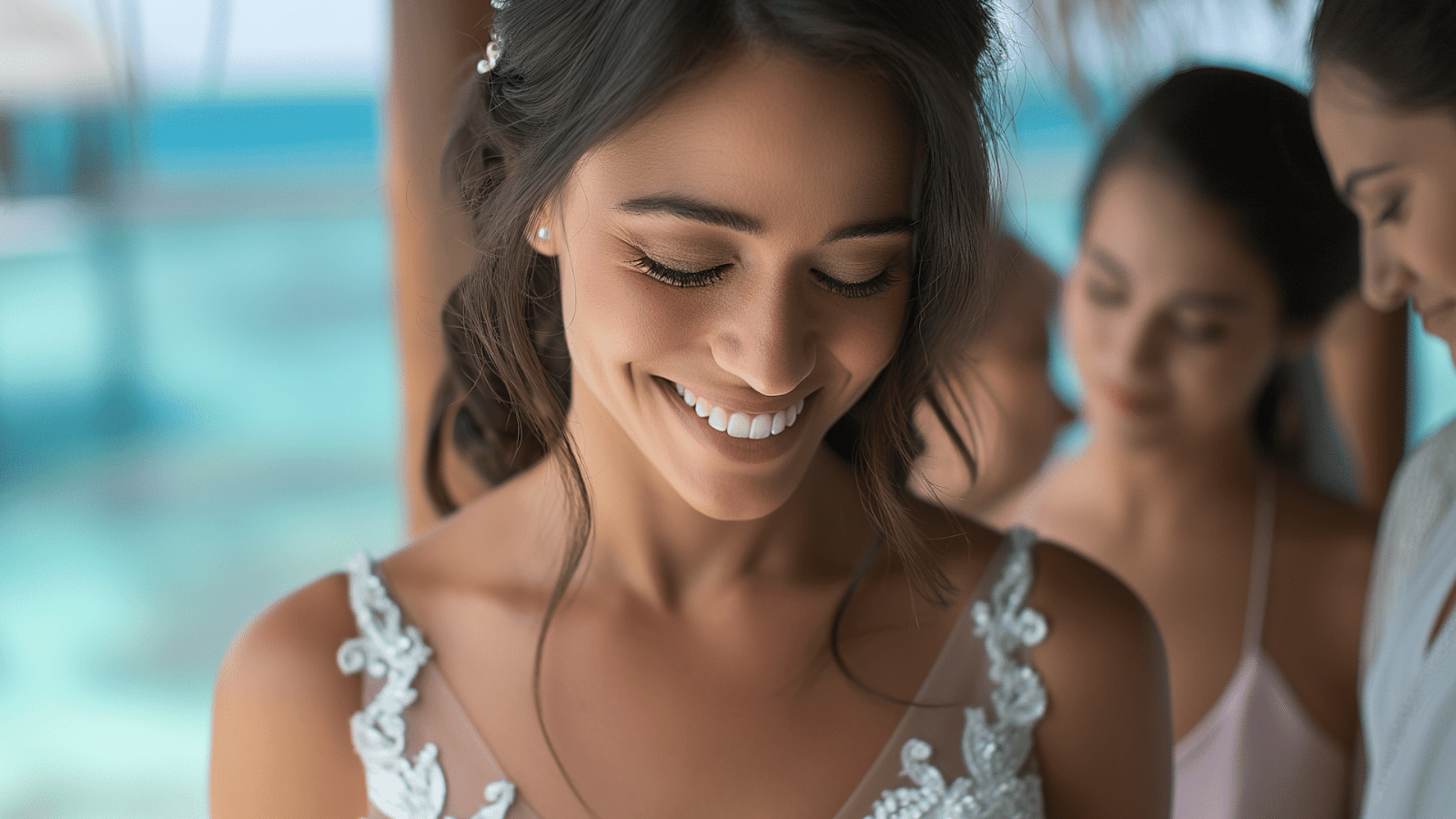 A bride is all smiles on her wedding day in the Maldives with her bridesmaids in the background