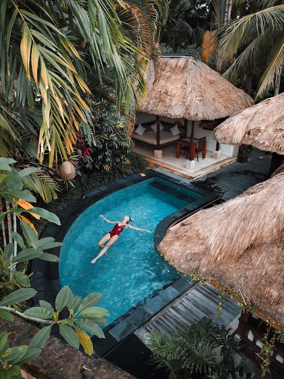 a person swimming in a villa in Bali