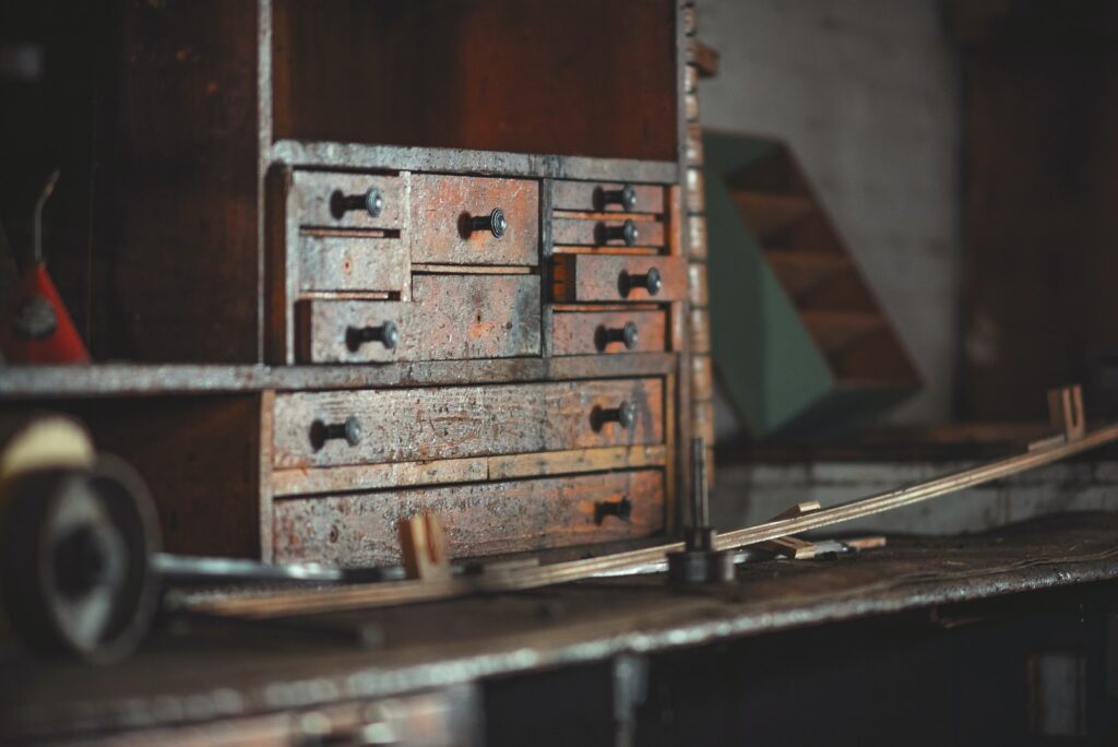 brown wooden drawer on top of brown surface