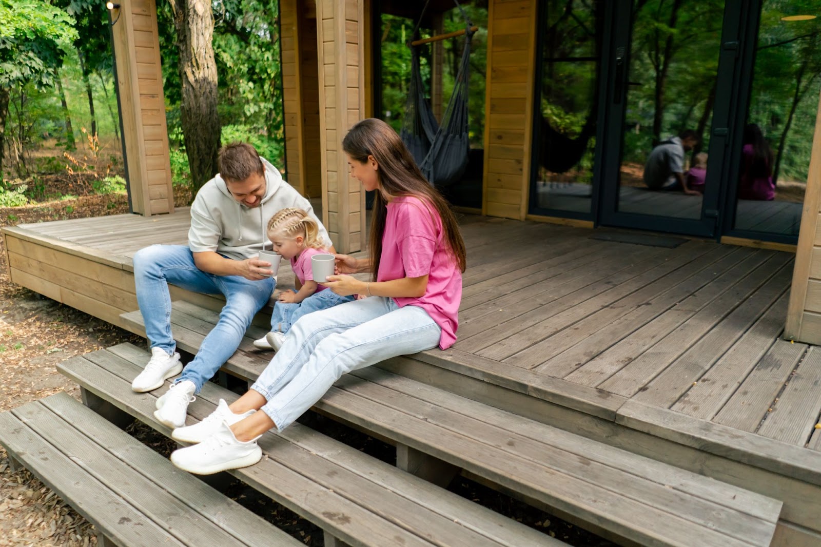 A happy family spending time together in their country house.