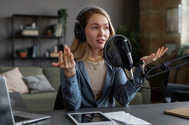 Young woman making podcast medium shot