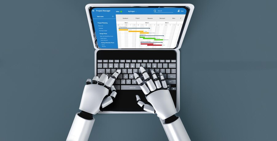 Robot hands doing business project management on a laptop