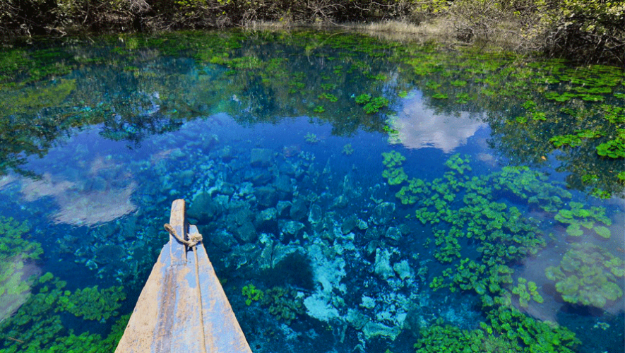 Boat in Blue water in the Azul crater.