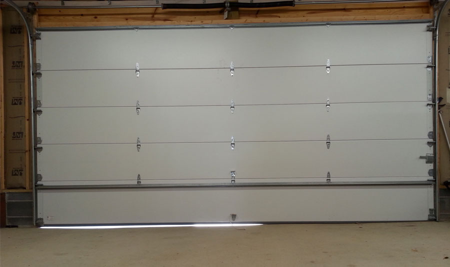 how to seal garage door gaps