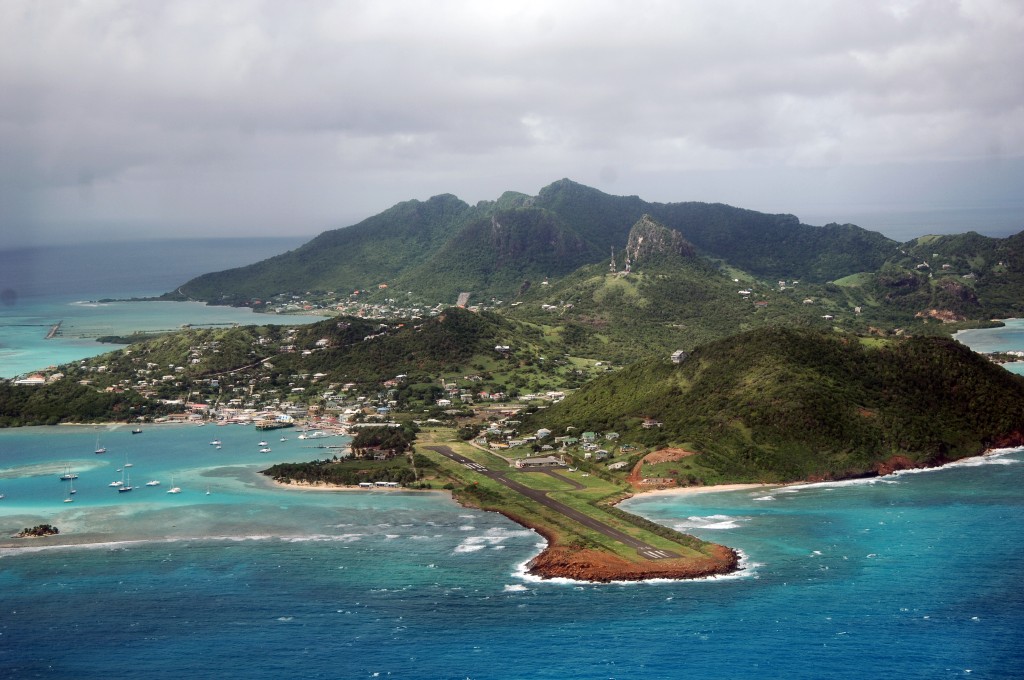 Top view of Saint Vincent and the Grenadines showcasing lush green mountains and beautiful water.