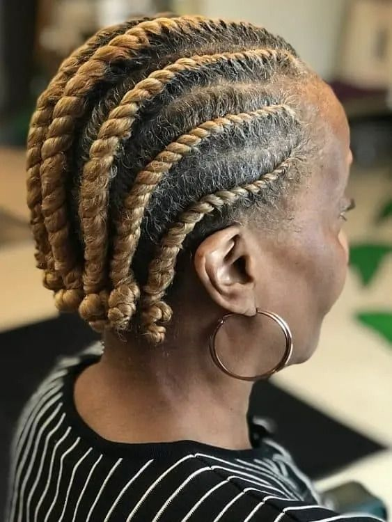 Back view  of a lady  wearing the Flat twist