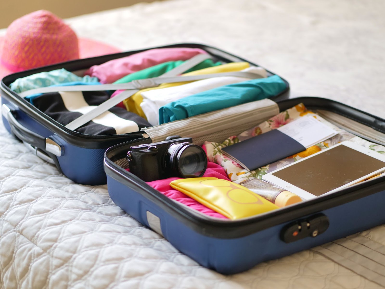 Trolley bag holding Clothes and other travel essentials being packed for a trip.