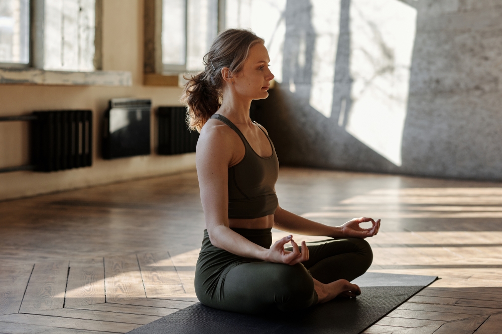 Women performing meditation--Ways to deal with restlessness during meditation

