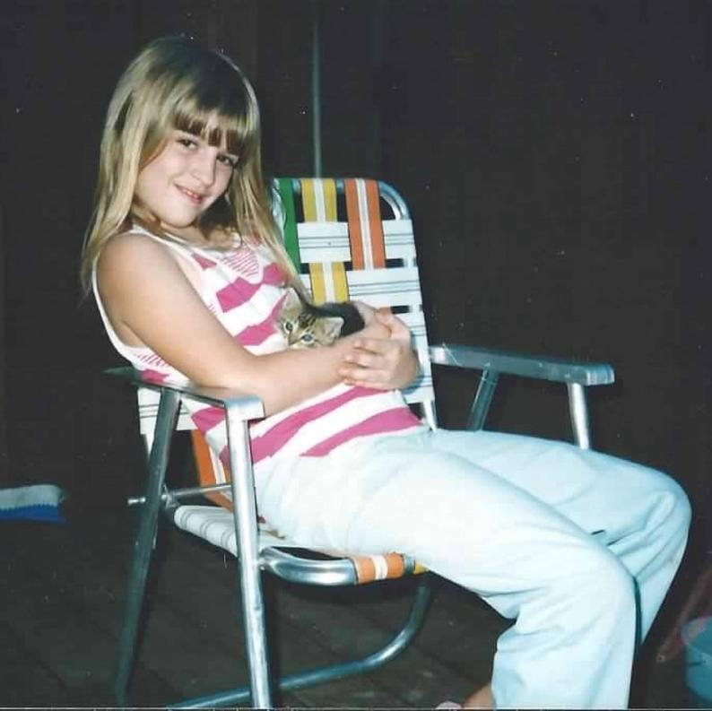 Another photo of the author from her childhood, before she began her healing in community journey.