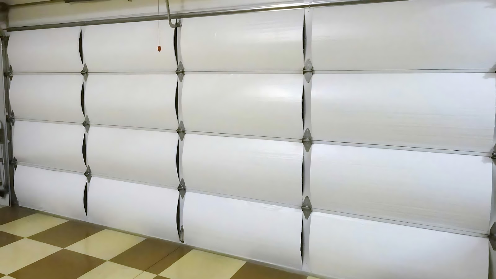 A residential garage door with high R-value insulation