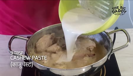 Smooth cashew paste being prepared for thickening the Chicken Kali Mirch gravy.