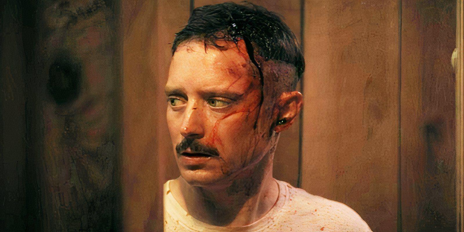 Elijah Wood with a bloody head in Come to Daddy