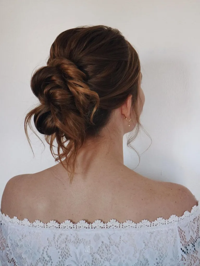 Picture of a lady wearing her gorgeus hairdo in  knots