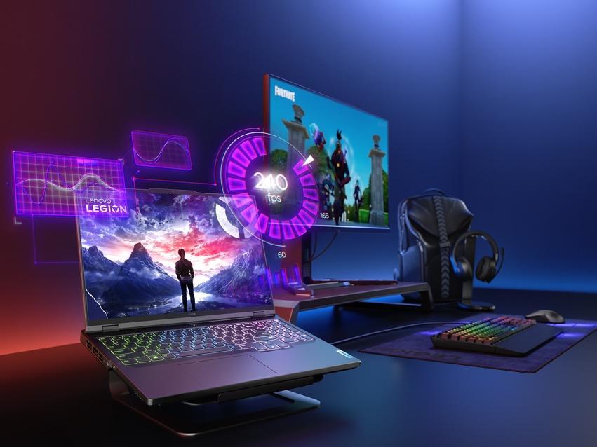 A computer and monitor on a desk

Description automatically generated