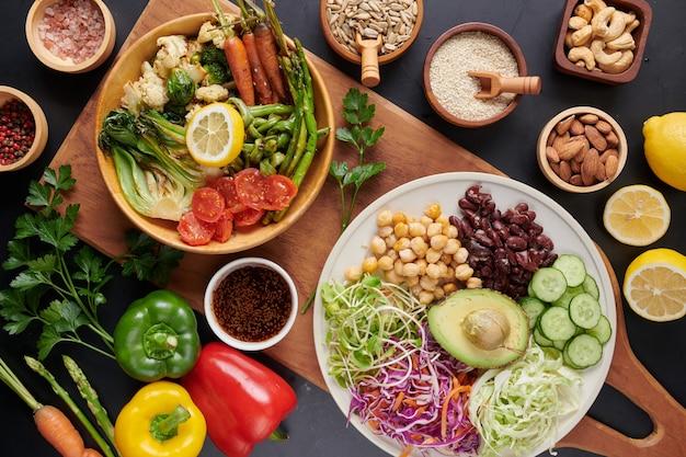 Free photo buddha bowl dish with vegetables and legumes. top view.