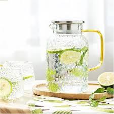 A pitcher of water with limes and mint leaves

Description automatically generated