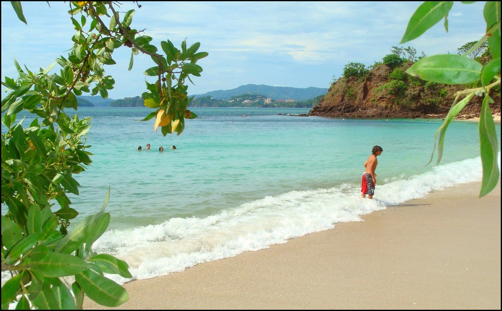 a boy enjoying on the beach