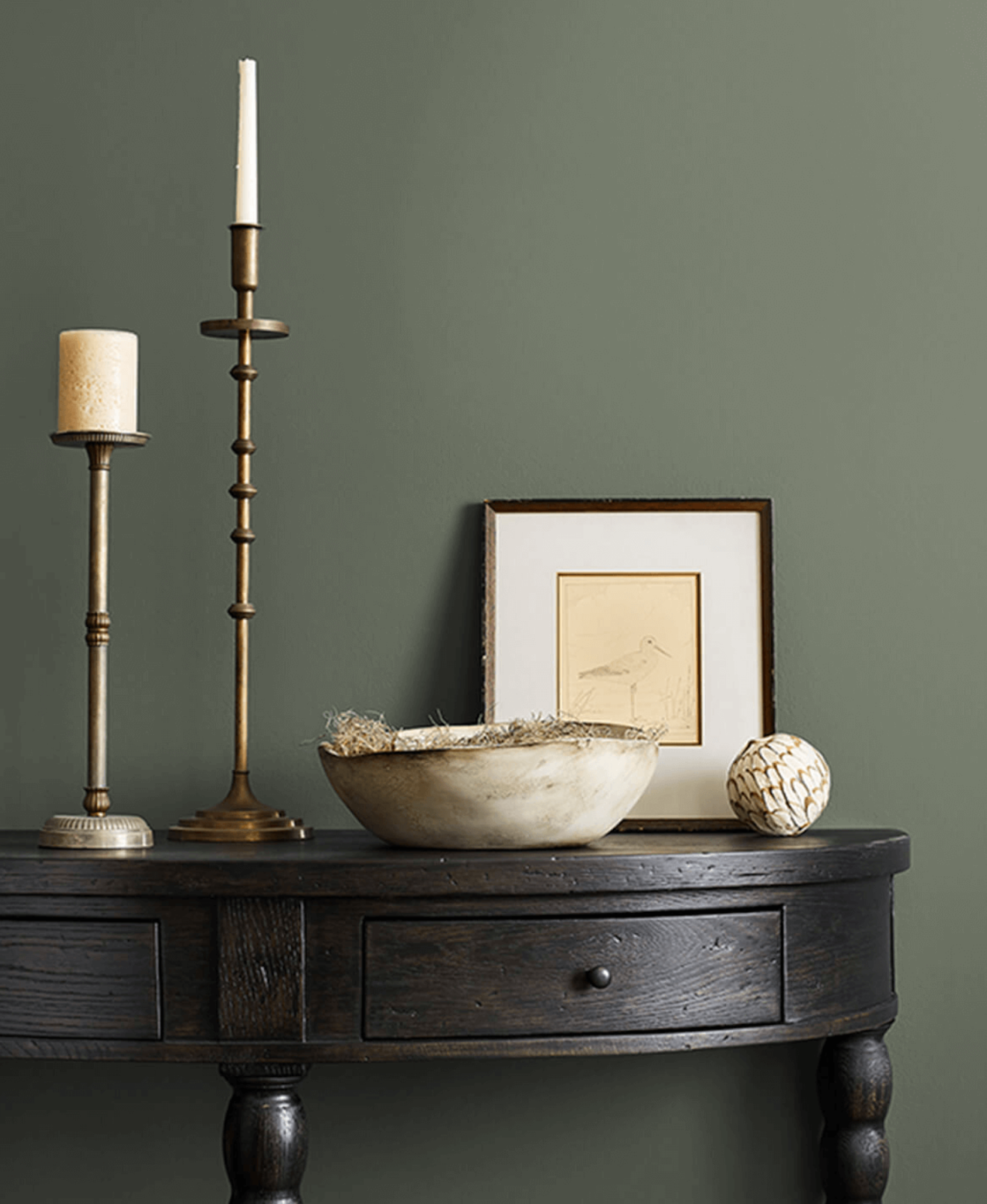 Sherwin williams rosemary green entry way table with gold candlesticks and raw wood decor