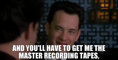 A GIF with two men talking, one of which says “And you’ll have to get me the master recording tapes”