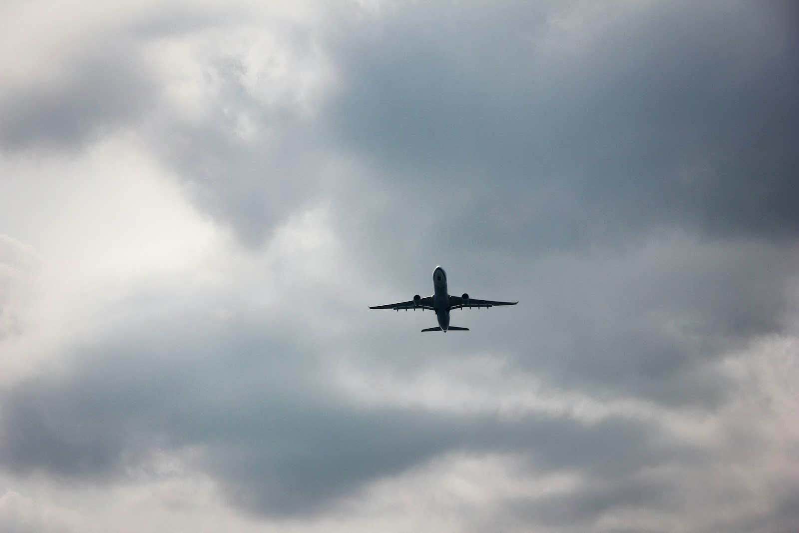 An airplane soaring in the sky