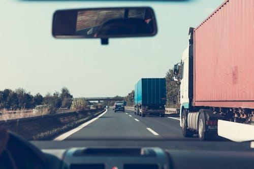 Free Blue and Red Freight Truck on Road Stock Photo