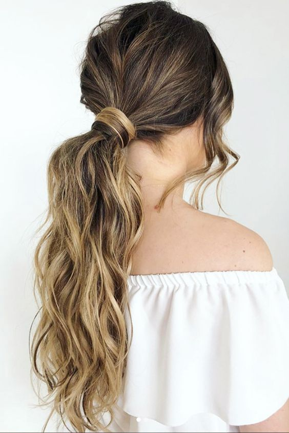 Picture of a lady wearing a Voluminous Ponytail with Extensions