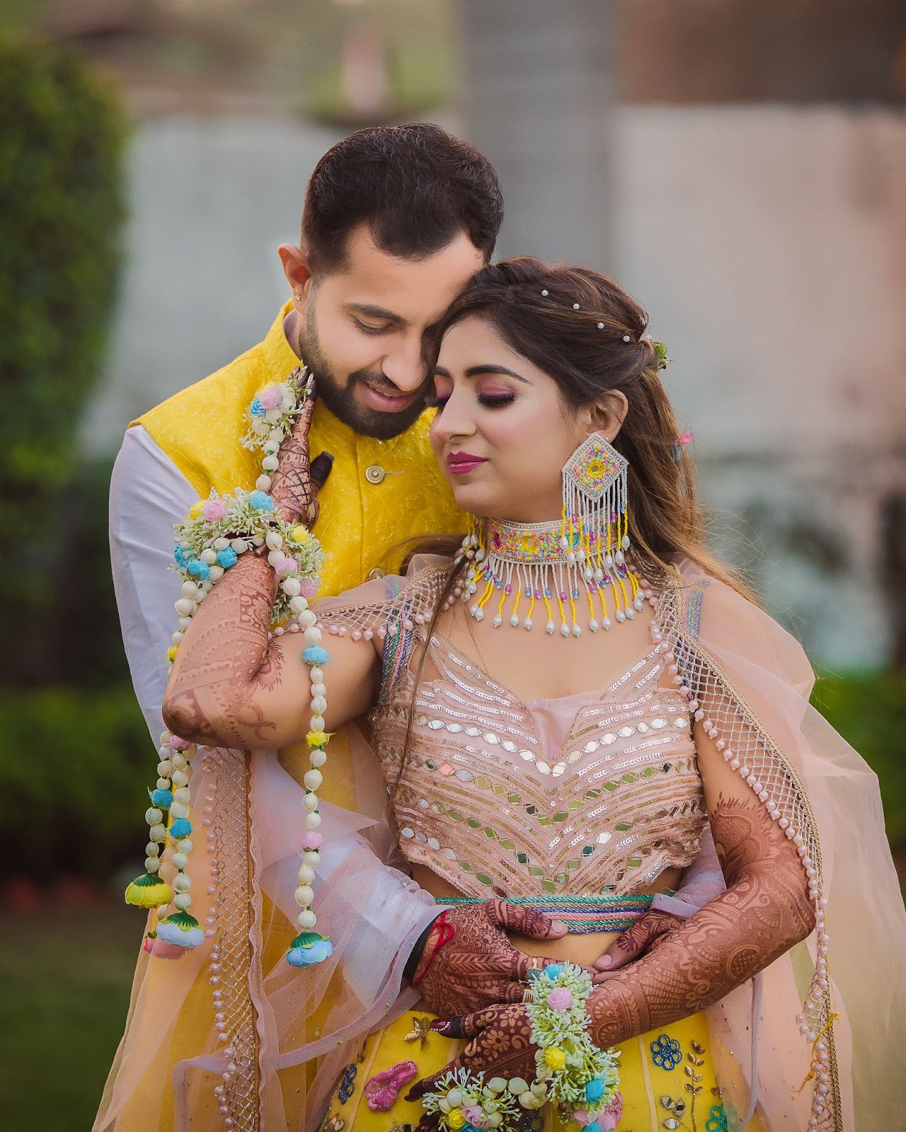 Wedding Photographer in Indore - Harsh Studio Photography : Bride and groom posing at an angle for wedding photo