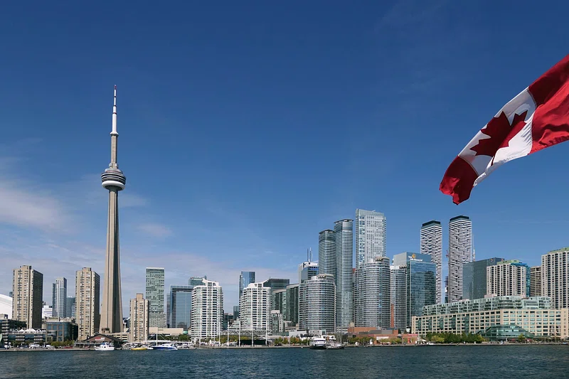 View of Canada, the safest places to travel and Canadian Flag.