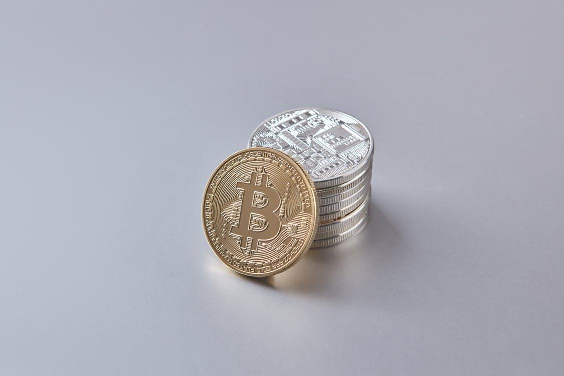 Free A Bitcoin on a Gray Surface Stock Photo