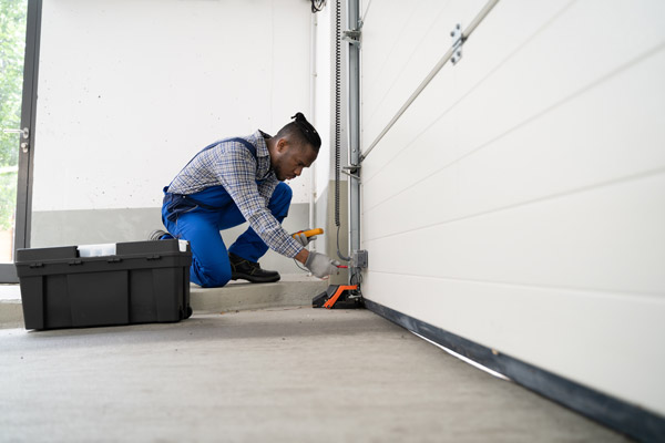 how to realign garage door sensors