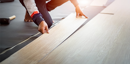 contractor installing flooring 