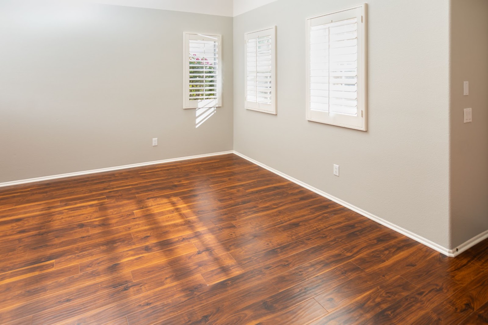 A brand new wood-patterned floor in a home.