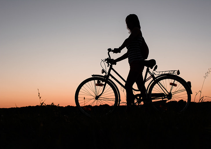 Fake Girl DP for Instagram riding a bicycle