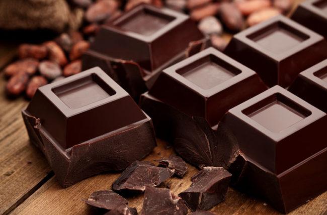 Dark chocolate squares on a table