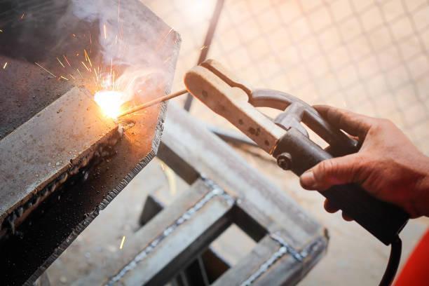 Welding  pieces of metal.