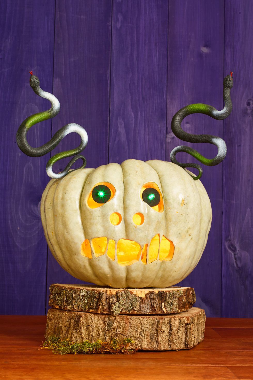 pumpkin carving ideas, white pumpkin carved to look like medusa