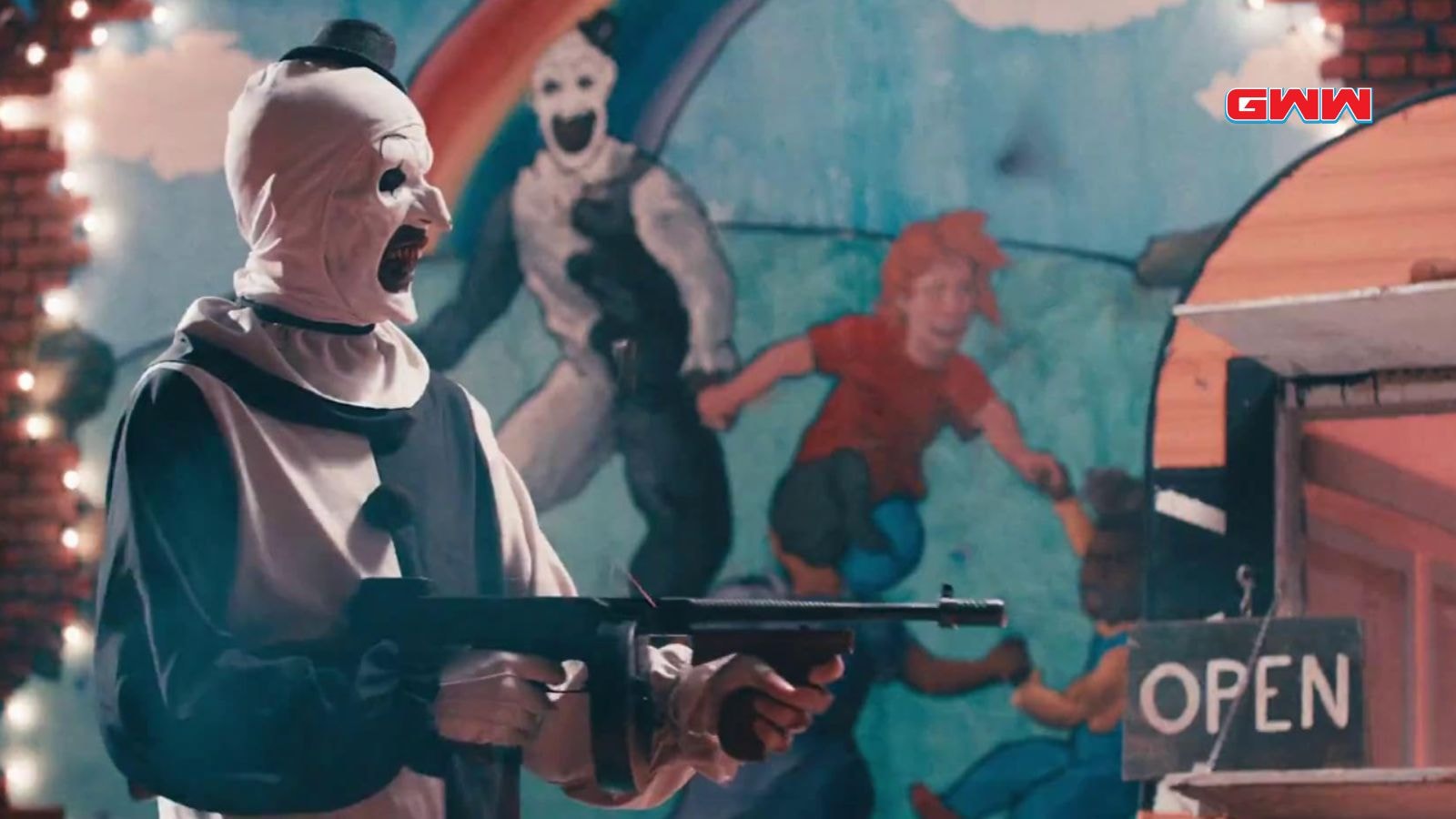 David Howard Thornton as Art The Clown holding a firearm, Terrifier 3 Trailer