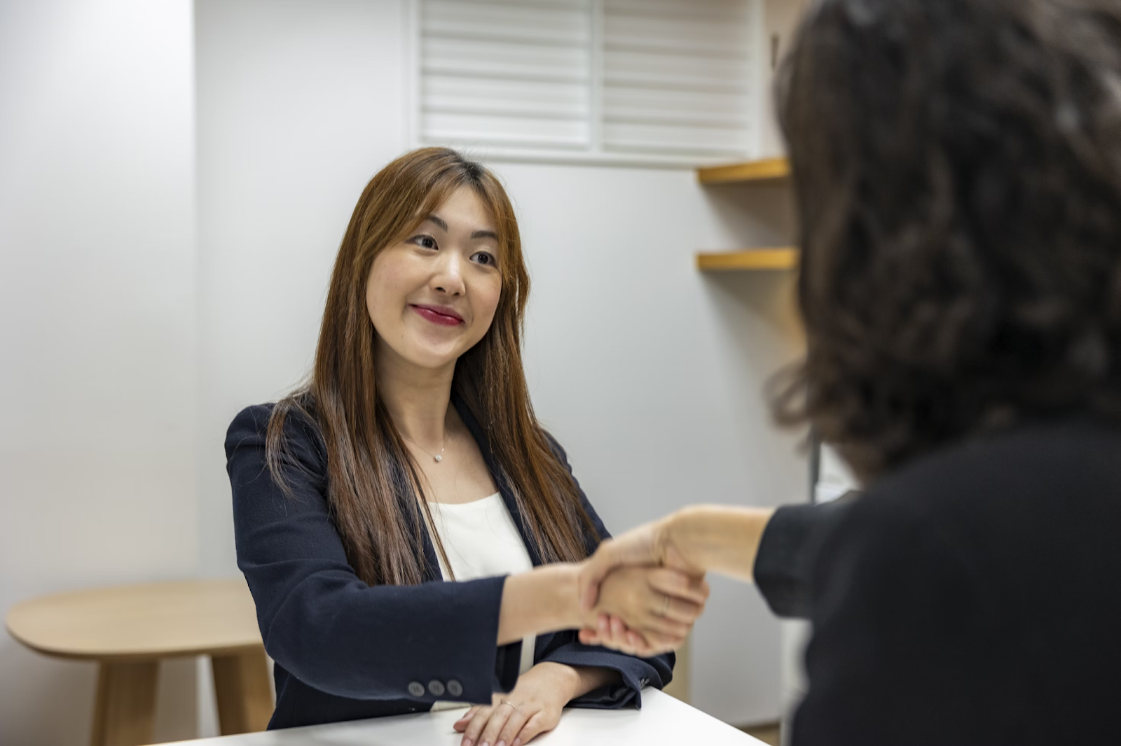 Women shaking hands