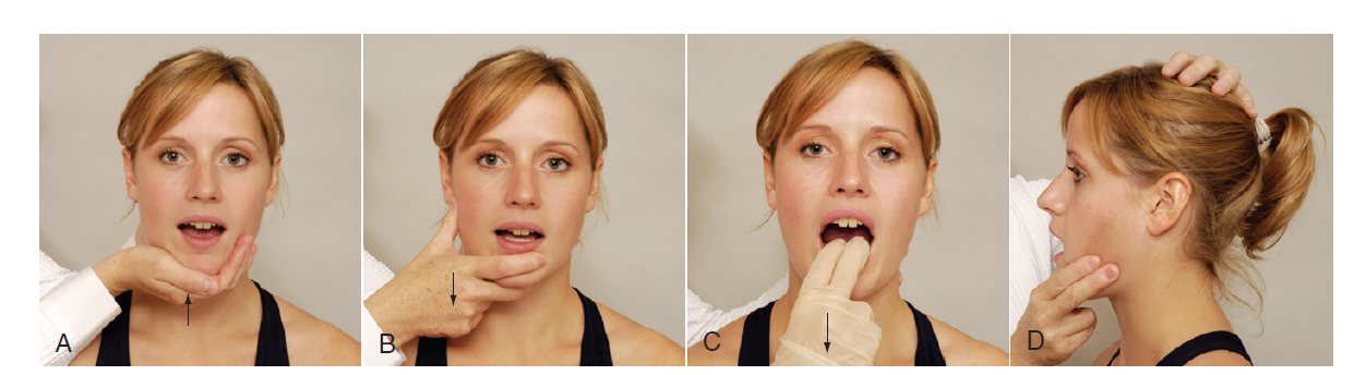 A person with her hand on her mouth

Description automatically generated