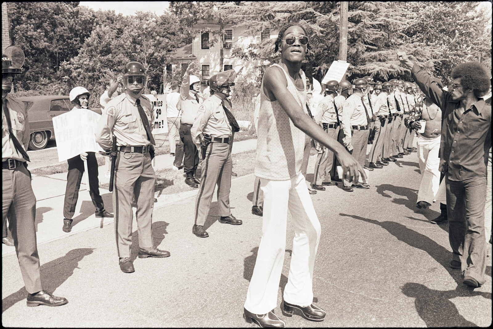 Protestors and police at protest against the death penalty, 1974.
